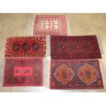 Small Tekke-style rug centred by three quartered medallions, 80cm x 45cm,