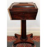 William IV mahogany teapoy of sarcophagus form, enclosing two canisters,