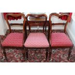 Set of four early Victorian rosewood bar back dining chairs with tapestry drop-in seats,