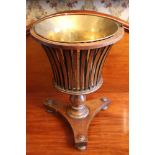 Georgian-style mahogany jardinière of pierced bucket form, brass liner with swing handle,