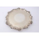 Edwardian silver pie crust salver with shell and scroll border on three scroll feet (Birmingham