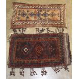 Unusual tribal rug on chocolate-brown ground with three radiating medallions,