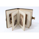 Small Victorian carte de visite photograph album containing images of Queen Victoria,