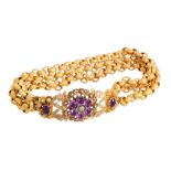 Regency gold and amethyst bracelet with three strands of textured gold links,