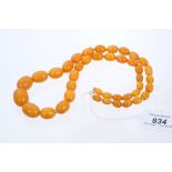 Old amber bead necklace with a string of graduated 'butterscotch' amber beads measuring