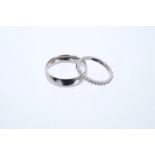 Platinum and diamond wedding ring/eternity ring with a half hoop of fifteen brilliant cut diamonds,
