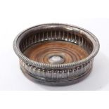 George III silver wine coaster of circular form, with fluted decoration,