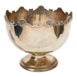 Early George V silver punch bowl of circular form, with shell and scroll border,