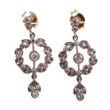 Pair of Belle Epoque style diamond pendant earrings each in the form of a foliate wreath with an