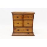 19th century pine spice cabinet with four short over one long drawer, on plinth base,