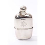 Edwardian silver spirit flask of shaped form, with engraved monogram,