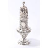 Large Victorian silver sugar caster of wrythen baluster form,