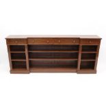 19th century and later dwarf inverted breakfront bookcase with four short frieze drawers and open