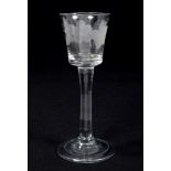 Mid-18th century wine glass with bucket-shaped bowl, engraved with grapevines,