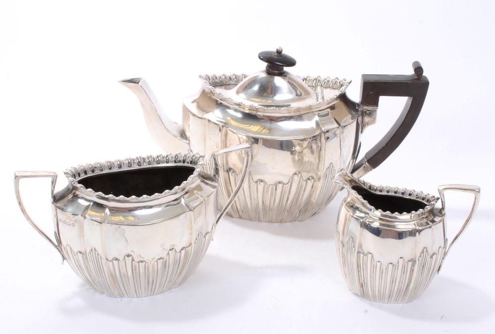 Victorian silver three piece tea set - comprising teapot of panelled form,