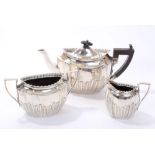 Victorian silver three piece tea set - comprising teapot of panelled form,