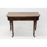 Victorian mahogany D-shaped side table with ring-turned legs on brass cappings and castors,