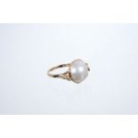 9ct gold Mabe cultured pearl and diamond ring with rustic shoulders.