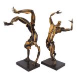 Sophie Dickens pair of impressive contemporary wooden sculptures - Somersaulting Figures, signed,