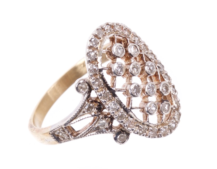 Edwardian-style diamond ring, the oval plaque with an openwork lattice design,