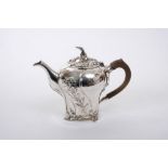 Victorian silver bachelor teapot of inverted baluster form, with wrythen bands of floral decoration,