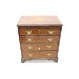 George III mahogany and boxwood line-inlaid dressing chest of small size with brushing slide and