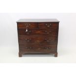 George III mahogany chest of two short over three long graduated drawers each with original brass