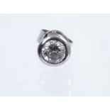 Diamond single stone ear-stud with a brilliant cut diamond estimated to weigh approximately 0.