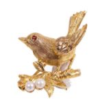 Novelty 9ct gold brooch in the form of a Robin, perched on a branch with cultured pearl berries.