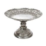 Victorian silver tazza of circular form, with embossed fruit and floral border and shaped rim,