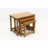 Nest of three Robert 'Mouseman' Thompson oak occasional tables,