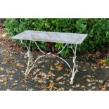 Stone-topped garden table, the rectangular top in wrought iron X-frame stand,
