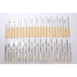 Set of twelve pairs of 1930s silver fruit knives and forks with mother of pearl handles (one knife