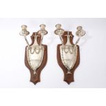 Pair of good quality Adams-style silvered twin-branch wall lights,
