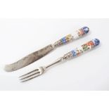 Mid-18th century Continental porcelain-handled knife and fork with pistol-shaped grips in the