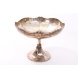 George V silver tazza of circular form, with reeded border and faceted bowl,