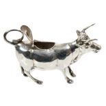 Late 19th century Continental silver cow creamer with hinged cover on back (Import marks for London