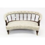 Edwardian kidney-form mahogany settee,