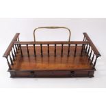 Regency rosewood book stand with finely turned H-shaped gallery,
