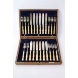 George V set of twelve pairs of silver fish knives and forks with ivory handles (one fork lacking)