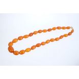 Old amber bead necklace with a string of graduated 'butterscotch' amber beads measuring