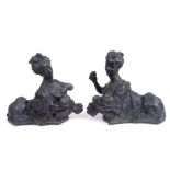 Pair of unusual 19th century French leaded bronze chenet in the form of a sphinx suckling a baby,