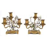 Pair 18th century Meissen miniature equestrian figures, with later gilt metal candelabra mounts,