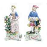 Pair 18th century Bow porcelain Seasons figures of a boy with hand muff and brazier emblematic of