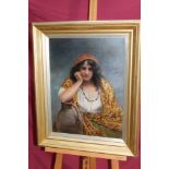 Late 19th / early 20th century Continental School oil on board - portrait of a gypsy girl leaning