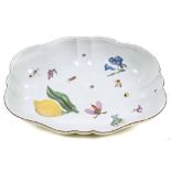 18th century Chelsea lobed oval dish, circa 1755, the interior polychrome painted with lemon,