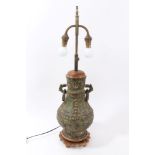 Chinese bronze table lamp in the Archaic style, of baluster form, with projecting ring-handles,