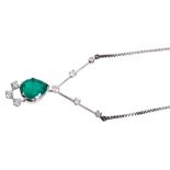 An emerald and diamond pendant necklace, the pear shaped emerald measuring approximately 10.5 x 8.