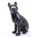 Gallé-type black glazed pottery pug dog with glass eyes and overhung bottom jaw, circa 1900 - 1910,