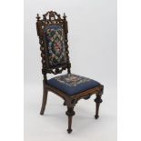 Victorian carved oak hall chair with floral tapestry seat and back,